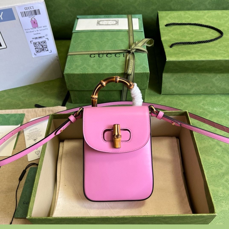 G*u*i top handle bags
